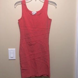 Salmon pink body hugging dress